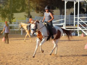 Girl riding a horse