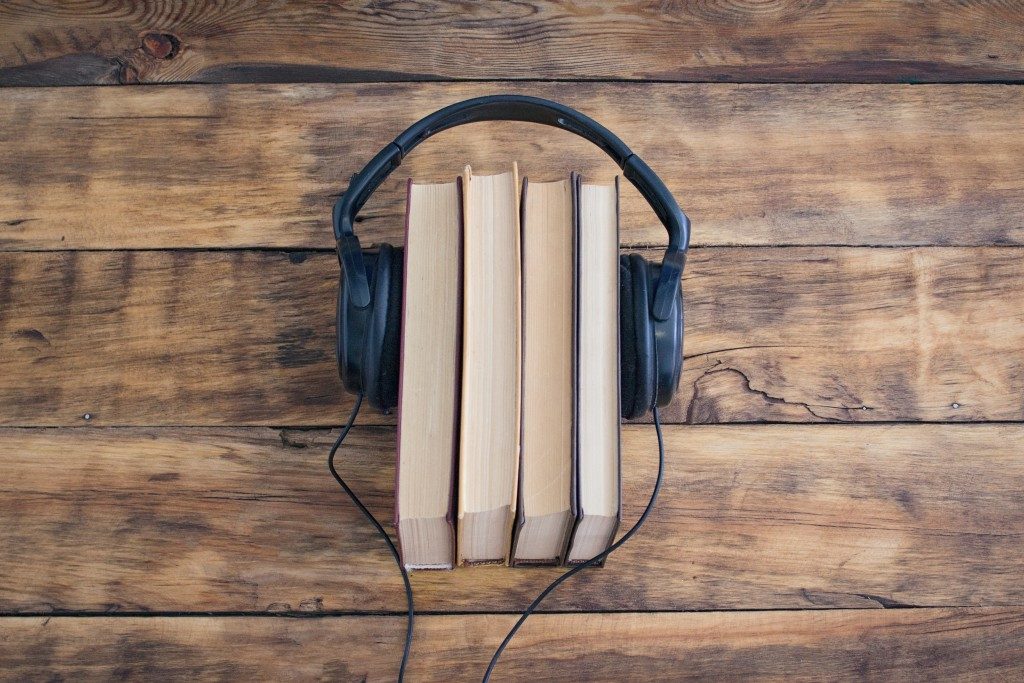 Headphones on the pile of books