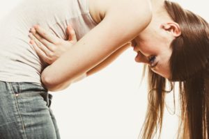 woman suffering from menstrual cramps