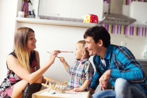 Parent and child playing
