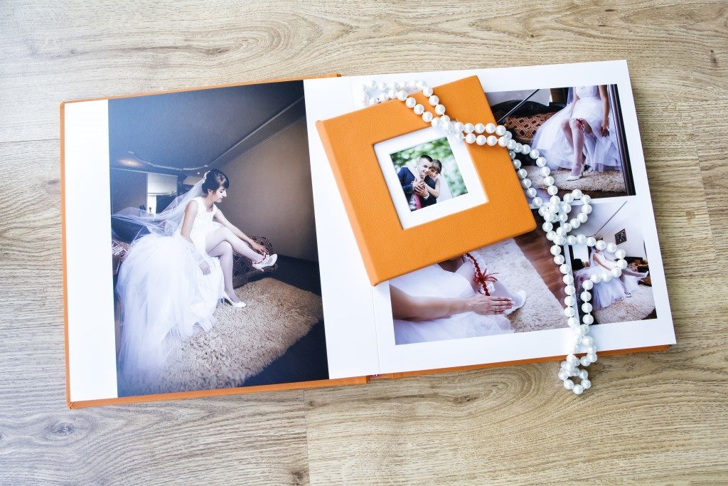 Wedding photo album spread and CD box