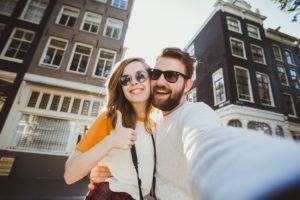 tourist couple taking a selfie