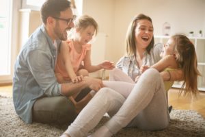 family of four having fun