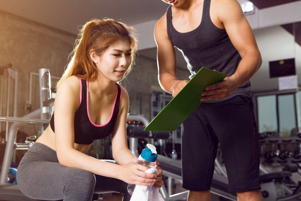 exercising with trainer