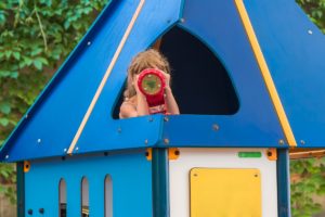 toddler playing in the playground