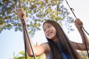 girl swinging