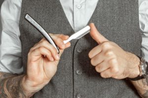 man using a shaver