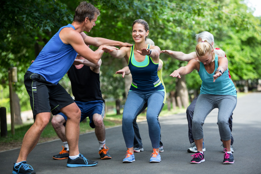 people doing exercise together