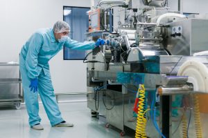 someone checking medical samples in a machine