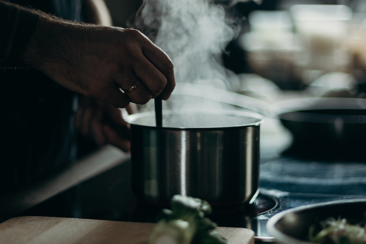Person Cooking in Pot
