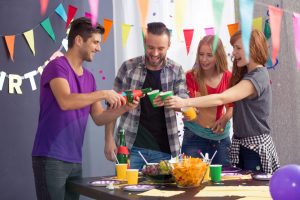 Friends drinking in a birthday party