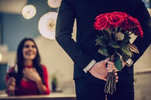 man with flowers for his date