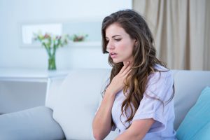 Woman with asthma at home